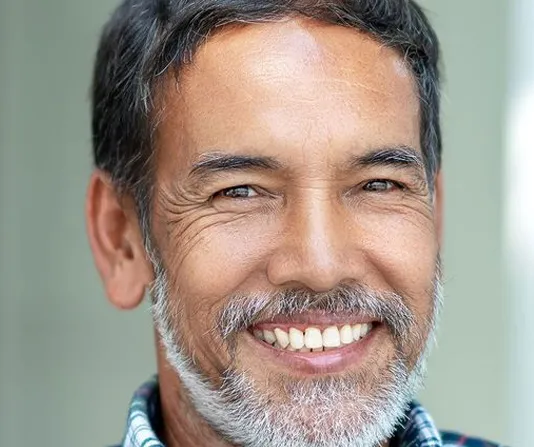 Implant patient showing a very nice smile